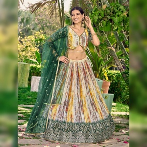 Awesome White <b>Green</b> Sequins Chinnon <b>Silk</b> Party Wear Traditional Lehenga Choli with Zari Embroidery and Sequin Detailing - Product Image 1