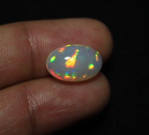 Ópalo Welo Etíope Superfino, Cabujón de 15*9.5*7.5mm, 5 Quilates, Gema Suelta Natural con Multiflujo de Color, Piedra de Nacimiento de Octubre - Product Image 1
