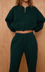 ชุดเซ็ตเสื้อครอปท็อปและกางเกงขายาวสไตล์ล่าสุด ราคาประหยัด สำหรับผู้หญิง ชุดลำลองแนวสปอร์ต ขายส่ง - Product Image 3