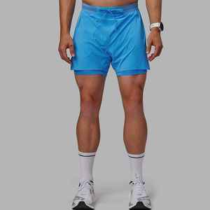 Shorts de sport pour homme en polyester tissé 100 %, bleu uni, séchage rapide, avec cordon de serrage à la taille et design mi-longueur - Product Image 2