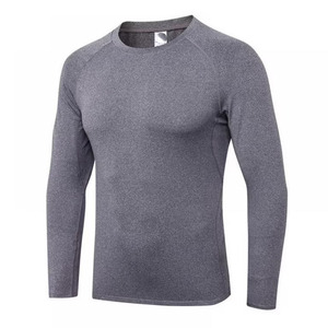 เสื้อเชิ้ตบีบอัดสำหรับผู้ชาย สีพื้น แขนสั้น ชุดออกกำลังกาย แห้งเร็ว คุณภาพสูง - Product Image 1