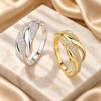 Bague en argent sterling 925 avec zircon, feuilles pavées et arcs torsadés polis, motif feuille croisée