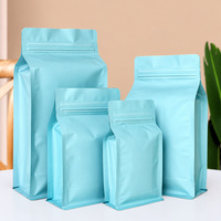 Sachet de café spécial bleu ciel, scellé sur huit côtés, avec fond plat, valve et pochette zippée