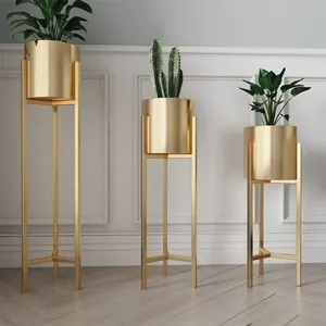 Macetero redondo minimalista de metal con elegante soporte para realzar tu espacio interior y añadir belleza natural a cualquier habitación. - Product Image 3