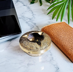 Antique <b>vintage</b> brass round <b>ashtray</b> featuring detailed traditional engravings, available at wholesale prices. - Product Image 1
