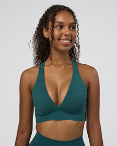 Conjunto Deportivo para Mujer con Sujetador Deportivo Cruzado con Escote en V Profundo, Shorts de Cintura Alta sin Costuras, Color Sólido, Transpirable y de Secado Rápido para Yoga y Fitness - Product Image 1
