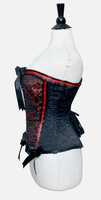Corset Overbust pour femme en brocart noir et rouge à motifs floraux, avec dentelle rouge et noire sur les côtés, et busque avant en acier pour la poitrine et les hanches