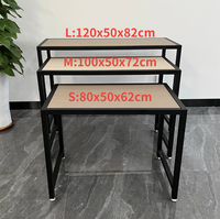 Tables de présentation de vêtements autoportantes modernes en bois noir, 3 emplacements, revêtement poudré, emballées en carton, montage facile pour la vente au détail