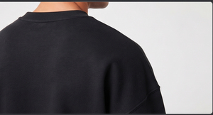Conjunto de dos piezas holgado para hombre: Camiseta de manga larga 100% algodón polar y pantalones cortos de chándal hasta la rodilla con hombros caídos - Product Image 4