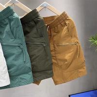 Shorts cargo d'été pour hommes en toile fine, décontractés, avec poches zippées, couleur unie, séchage rapide, taille élastique, coupe droite
