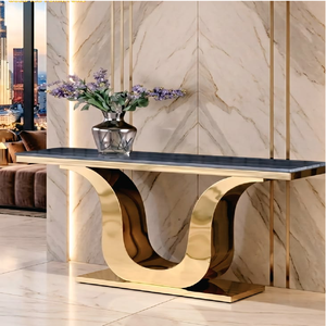 Luxury <b>console</b> <b>table</b> featuring a dark marble top on geometric faceted gold pedestal <b>legs</b>, available at wholesale prices. - Product Image 6