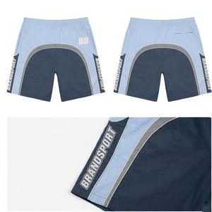 กางเกงขาสั้นวินด์เบรกเกอร์โพลีเอสเตอร์น้ำหนักเบา 115 GSM ตัดต่อสีดำส้ม ลายพิมพ์ซับลิเมชั่น ออกแบบโลโก้เองได้ เอวยางยืด สำหรับผู้ชาย - Product Image 6