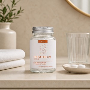 [FROM OREUM] Artículos Esenciales para Habitaciones de Huéspedes: Pasta Dental Sólida Sabor Mandarina de Jeju, 60 Tabletas para Baños de Hotel - Product Image 1