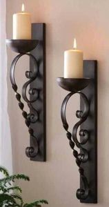 Portavelas de hierro de calidad garantizada, montado en la pared, con diseño de volutas para decoración del hogar. - Product Image 1