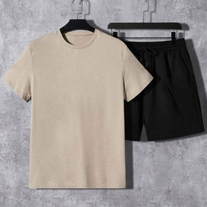 ชุดเซ็ตเสื้อยืดคอกลมแขนสั้นและกางเกงขาสั้นลำลองสำหรับฤดูร้อน แบบยูนิเซ็กซ์ เอวยางยืด สีพื้น ผ้าฝ้าย 100% ระบายอากาศได้ดี น้ำหนักเบา - Product Image 1