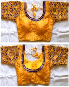 Blusa moderna con cuello redondo, con hilo y trabajo artesanal elaborado. La blusa tiene un diseño frontal abierto. - Product Image 1