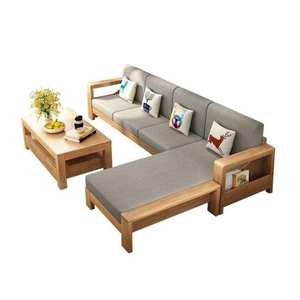 Conjunto de sofá minimalista en forma de L de madera con cojines grises y una mesa de centro a juego para sentarse en interiores. - Product Image 1