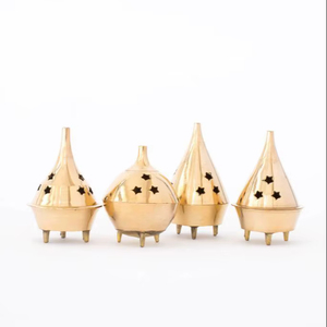 Brûleur d'encens en laiton à succès avec découpes en forme d'étoile et design élégant pour la décoration intérieure et l'aromathérapie - Product Image 1