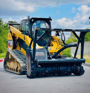 รถตักล้อยาง CAT 289D พร้อมอุปกรณ์ตัดไม้แบบไฮดรอลิกสำหรับงานป่าไม้ กำจัดไม้ ตัดหญ้า สำหรับงานหนัก - Product Image 1