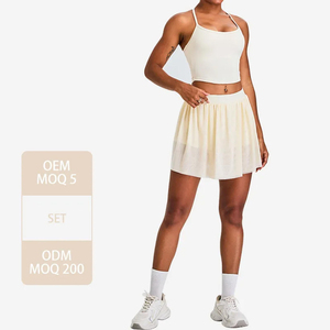 Ensemble de tennis pour femme : Haut court dos nageur, jupe-short plissée, coussinets de poitrine amovibles. Vêtements de sport. OEM ODM Logo personnalisé Vente en gros. - Product Image 4