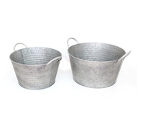 Seau à boissons ovale vintage avec un style industriel rustique pour la présentation sur table