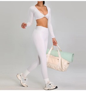 Long Sleeve Ruched High Waist Seamless Yoga Leggings Set Crew Neck Full Length Solid Color 2 Piece Set Spandex/Nylon Four-Way - Product Image 3