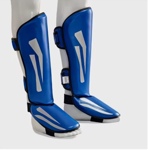 PROFIT SPORTS Protège-tibias en tissu de coton bleu avec impression réfléchissante, fermeture auto-agrippante, protection légère pour le kickboxing adulte - Product Image 1