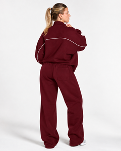 Conjunto Deportivo de Dos Piezas para Mujer con Cremallera Completa y Líneas en Contraste: Chaqueta Relajada y Pantalones de Pierna Ancha a Juego - Product Image 2