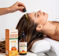 Huile de graines de citrouille 100% pure naturelle pressée à froid, huile végétale non raffinée pour les soins de la peau, des cheveux et du visage, vente en gros OEM ODM