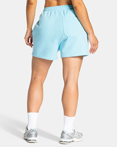Shorts pour femmes bleu clair avec détails contrastés, poches, taille élastique, tissu respirant et doux de haute qualité, fabricant OEM ODM - Product Image 2