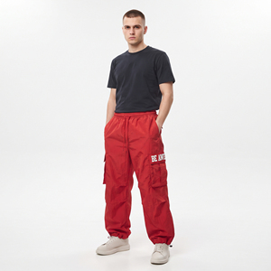 Wholesale <b>Men</b> Embroidered Logo Windbreaker Cargo Pant 100% <b>Nylon</b> Quick Dry Hiking Baggy <b>Joggers</b> <b>Men</b> Rain Wear Waterproof Pants - Product Image 1