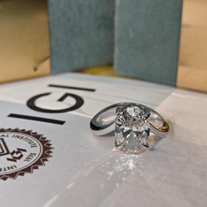 แหวนหมั้นเพชรทรงรี 3 กะรัต แบบมินิมอล ฝังเพชรรอบแบบซ่อน 14k ทองคำขาว สำหรับงานหมั้นและงานแต่งงาน - Product Image 1