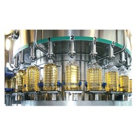 Machine de remplissage et de bouchage automatique de haute qualité pour l'huile comestible, l'huile de coco et l'huile d'arachide, disponible à la vente