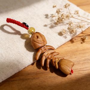 Breloque en bois de pêche sculptée à la main en forme d'arête de poisson, porte-clés articulé en bois, accessoire de sac bohème, cadeau en bois naturel sculpté - Product Image 4