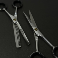 Ciseaux de barbier professionnels en acier inoxydable de haute qualité pour la coupe et l'éclaircissement des cheveux, pour un lissage et une finition impeccables