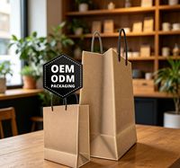 Sacs en papier de luxe personnalisés pour événements et boutiques. Sacs cadeaux en papier de marque avec poignée pour l'emballage de vente au détail de mode