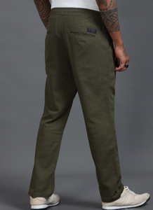 Premium Cotton <b>Trousers</b> For <b>Men</b> Green Solid Relaxed Fit Mid Rise Regular Pants With Four Pockets <b>Elasticated</b> Waistband - Product Image 1