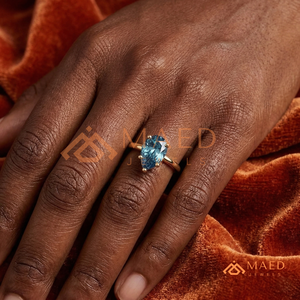 Bague de fiançailles unique en or rose plaqué or rose, sertie d'un moissanite bleu en forme de poire, bijoux de mariée en or rose - Product Image 4