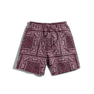 กางเกงขาสั้นกีฬาผ้าแคนวาสโพลีเอสเตอร์ 100% เอวกลาง มีเชือกผูก แห้งเร็ว สำหรับผู้ชาย เหมาะสำหรับวิ่ง ออกกำลังกาย ชายหาด และฝึกซ้อม พร้อมโลโก้แบบกำหนดเอง - Product Image 1