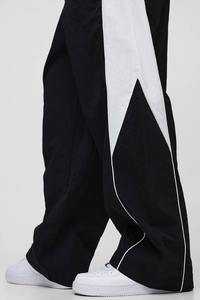 Pantalones Deportivos de Alta Calidad para Hombre, Reflectantes, Holgados, con Diseño de Bloques de Color, Cortavientos, Peso Medio, ODM - Product Image 3