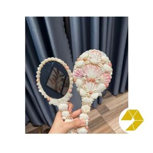 กระจกมือถือกรอบเปลือกหอยทำมือสไตล์วินเทจ ขายส่ง ของตกแต่งบ้านสไตล์ชายทะเลธรรมชาติ เหมาะสำหรับตกแต่งภายในบ้าน โรงแรม รีสอร์ท ของขวัญ ตลาด - Product Image 1