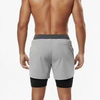 Short de sport pour homme respirant et compressif 2 en 1 en polyester avec poche pour la course et la gym