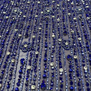 ผ้าลูกไม้ปักลายดอกไม้ประดับคริสตัลหนักสีน้ำเงินรอยัล ดีไซน์ล่าสุดปี 2026 สำหรับชุดราตรีงานพรอม - Product Image 1