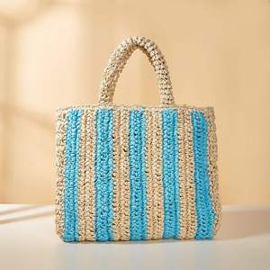 Refine your daily look with this classic Natural yarn bag designed with an artistic <b>top</b> edge and a patterned woven body today - Product Image 1