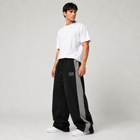 Pantalon de survêtement en coton noir pour homme, avec bande latérale grise, cordon de serrage haute élasticité, coupe décontractée ample, logo personnalisé sur la jambe gauche, respirant pour l'hiver