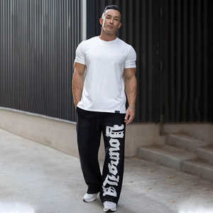 กางเกงวอร์มขาบานผ้าฝ้ายลำลองสำหรับผู้ชาย คุณภาพสูง เป็นมิตรกับสิ่งแวดล้อม แห้งเร็ว ดีไซน์ทันสมัย ปรับแต่งได้ เอวกลาง สวมใส่สบาย - Product Image 5