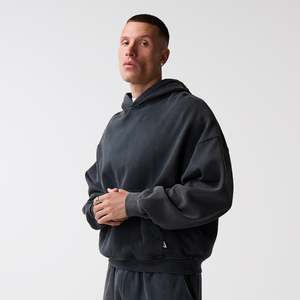 Ensemble de survêtement surdimensionné pour homme, comprenant un sweat à capuche ample et un pantalon de survêtement, en coton épais 100% avec logo personnalisé et effet délavé. - Product Image 3