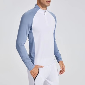 Chemise de performance pour homme à manches longues, col montant, blocs de couleur blanc et bleu, fermeture éclair quart de tour, anti-humidité, coupe ajustée, vêtement de sport - Product Image 2