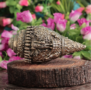 Intricately carved golden brass shankh displaying Lord Vishnu resting posture, ideal for gift, available at wholesale prices. - Product Image 6