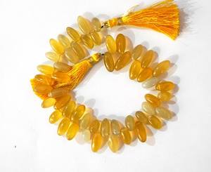 ลูกปัดหินแคลเซโดนีสีเหลืองธรรมชาติทรงข้าวเรียบ สำหรับทำเครื่องประดับ ขายส่ง - Product Image 2